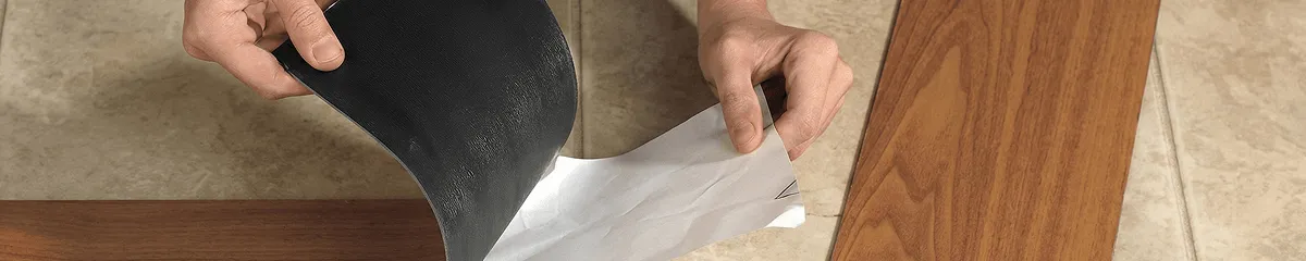 A professional installing vinyl flooring in Chandler, AZ